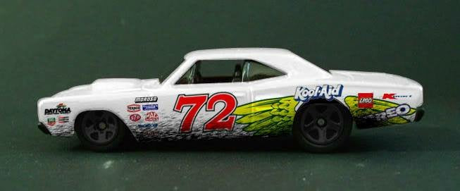 Number 72 Dodge Charger diecast in side profile